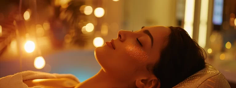 a radiant woman with glowing, lifted skin receiving a mesotherapy face treatment in a luxurious spa setting.